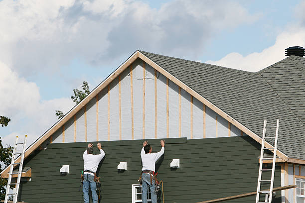 Professional Vinyl Siding technician working in Wyano, PA